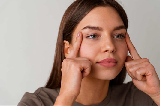 Woman with dark circles under eyes seeking treatment