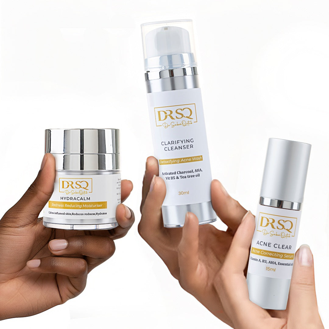 Women holding bottles of Acne Starter Kit, including Clarifying Cleanser, Acne Clear Serum, and Hydracalm Moisturiser