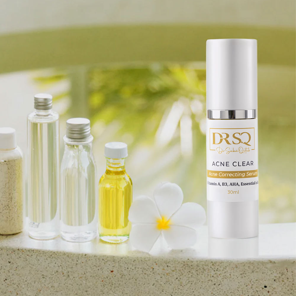 Acne Clear serum bottle placed with other skincare products