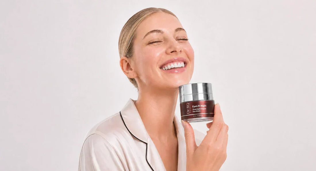 A woman showcasing the Eyelift Night Overnight Repair Eye Mask happily