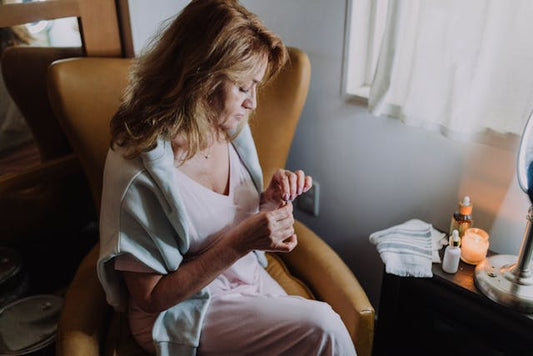 Woman with wrinkles is ready to do her anti-ageing skincare