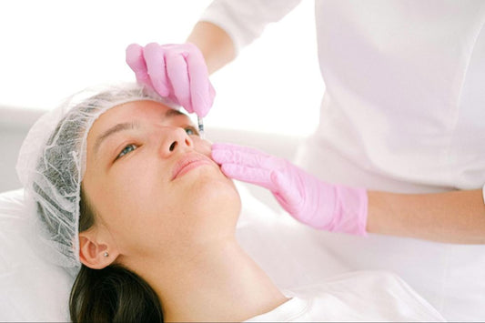 A woman taking hyaluronic acid injection to enhance skin’s texture