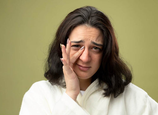 Woman dealing with under-eye bags and dark circles