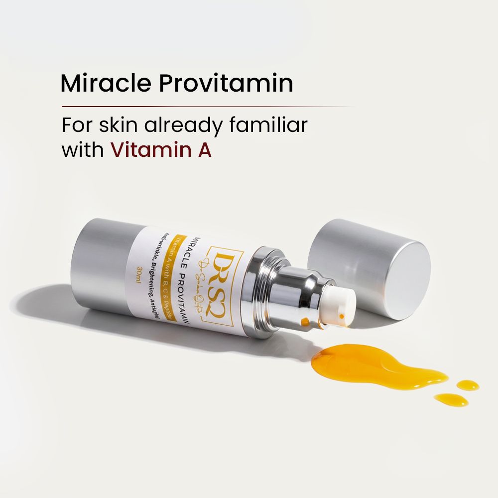 A spilled bottle of Miracle Pro Vitamin serum is shown with texture 