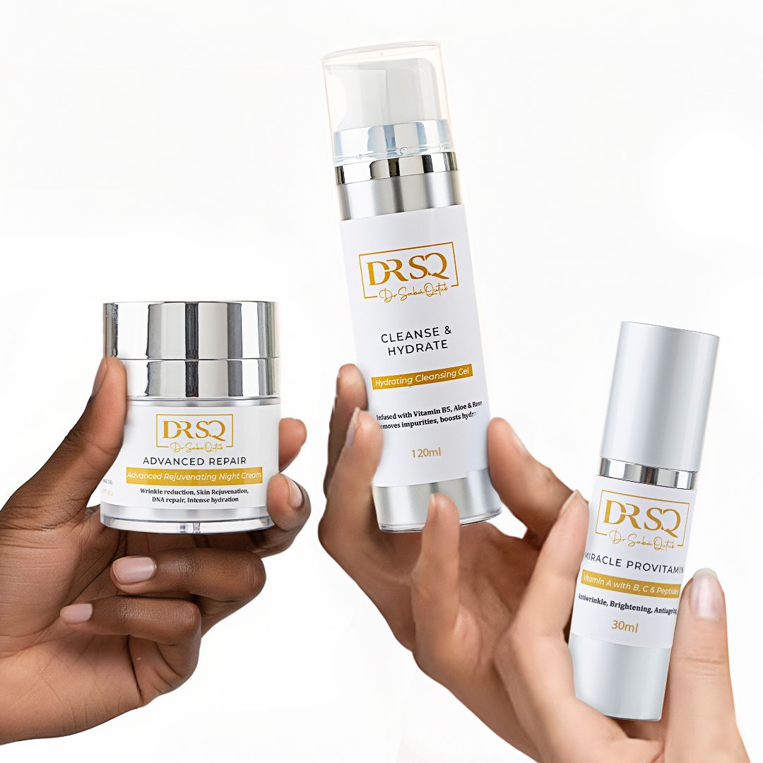 Women holding bottles of Anti ageing essentials Kit, including Cleanse & Hydrate Cleanser, Miracle Pro Vitamin Serum, and Advanced Repair